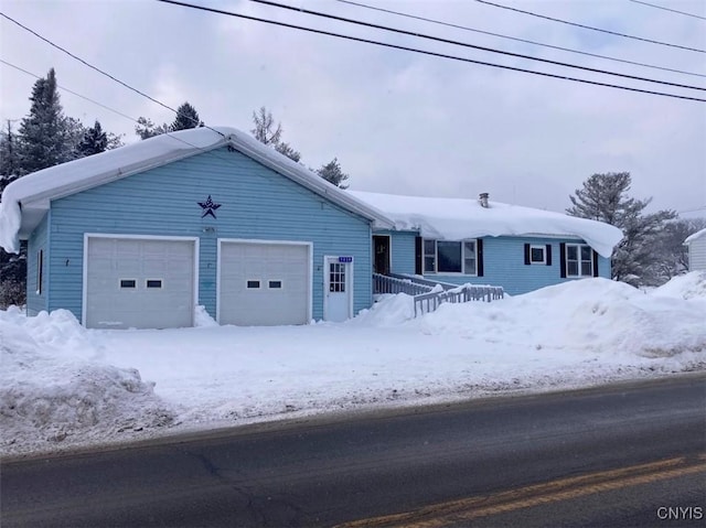 view of front of home with a garage