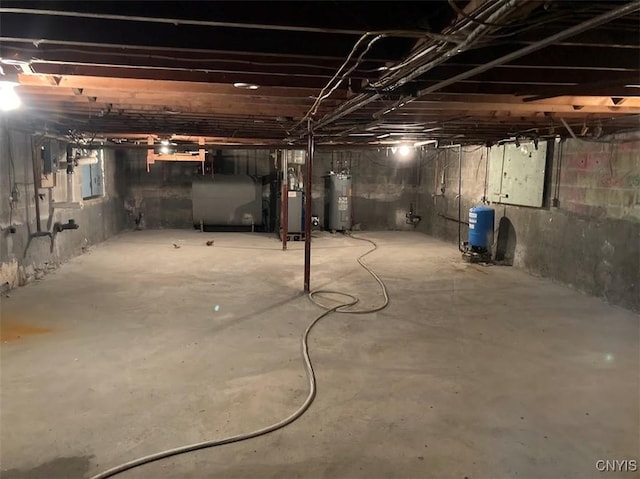 basement featuring electric water heater