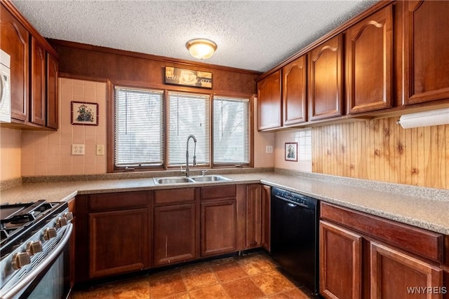 kitchen with sink, black dishwasher, tasteful backsplash, stainless steel gas range oven, and a textured ceiling