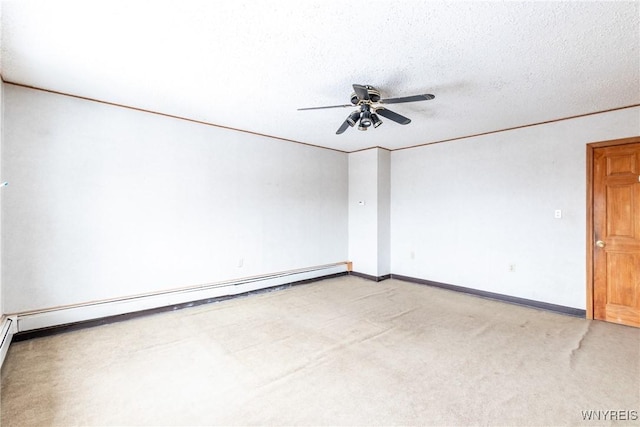 spare room with ceiling fan, carpet flooring, a textured ceiling, and baseboard heating