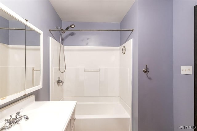 bathroom with vanity and tub / shower combination