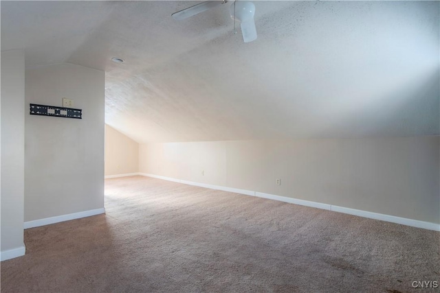 314 Stafford Ave, Marshall, NY 13480 - bonus room with vaulted ceiling, carpet, baseboards, and a ceiling fan