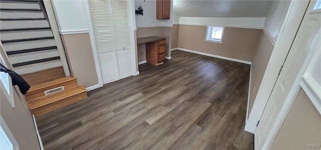 interior space with dark wood-type flooring