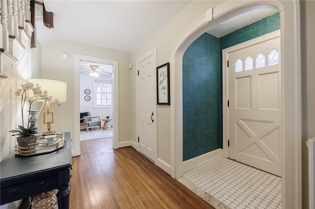 entrance foyer featuring hardwood / wood-style flooring and ceiling fan