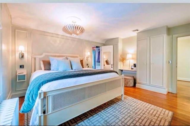 bedroom featuring hardwood / wood-style floors