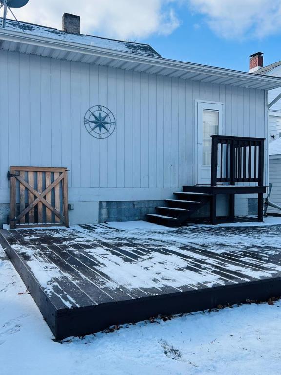 view of snow covered property entrance