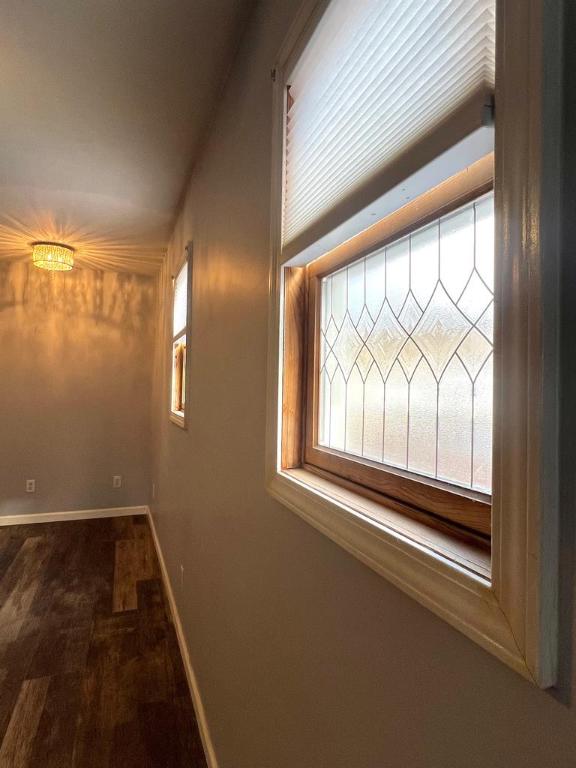 576 W High St, Erwin, NY 14870 - hall featuring wood finished floors and baseboards