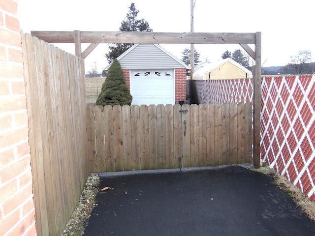 view of patio / terrace featuring a garage