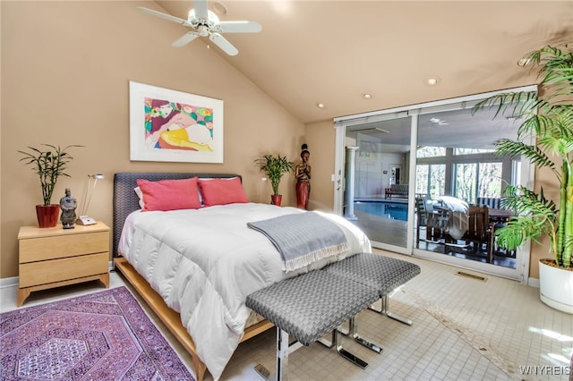 bedroom with vaulted ceiling and access to outside