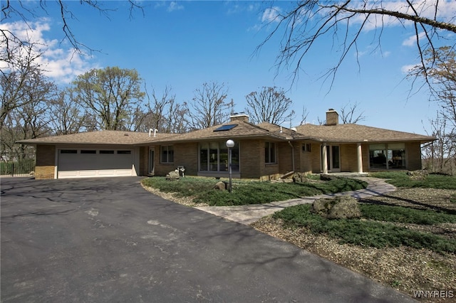 ranch-style house with a garage