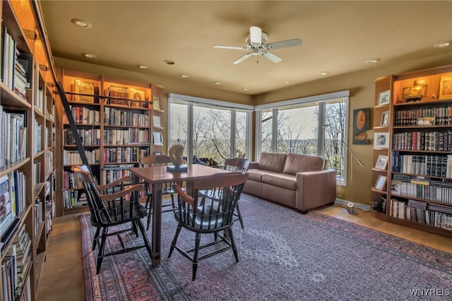 sitting room with ceiling fan