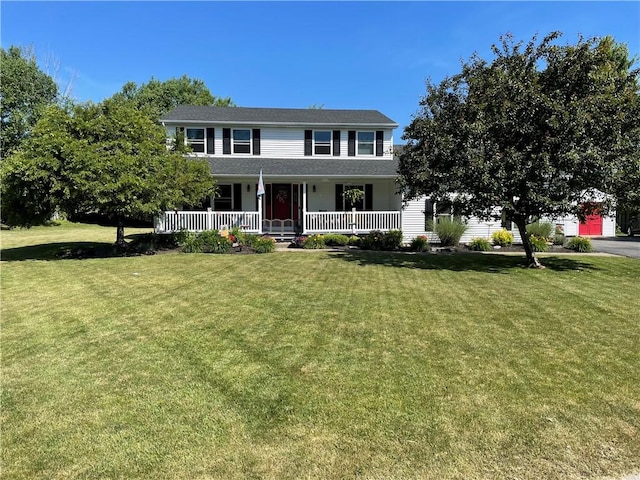 colonial house featuring a front lawn and a porch