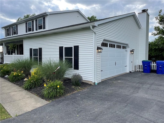 view of home's exterior with a garage