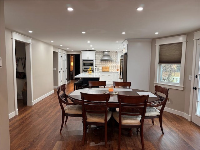 dining area featuring dark hardwood / wood-style flooring