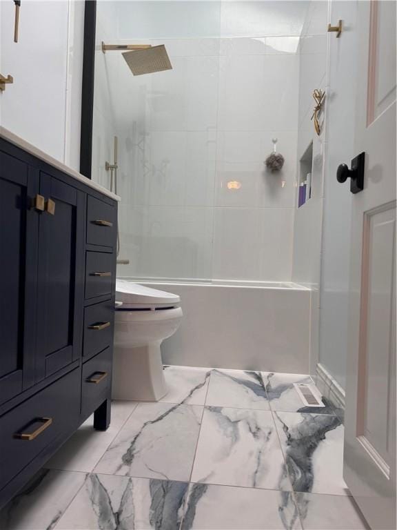 bathroom with shower / tub combination and toilet