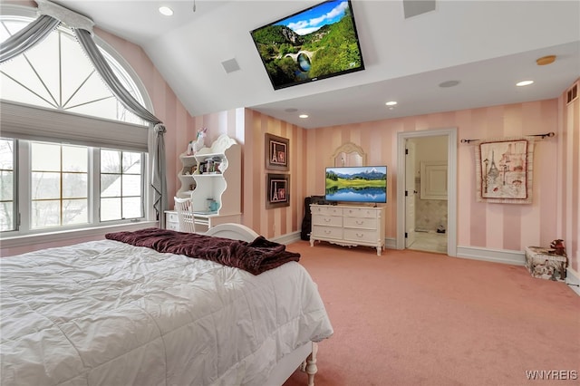 carpeted bedroom with high vaulted ceiling