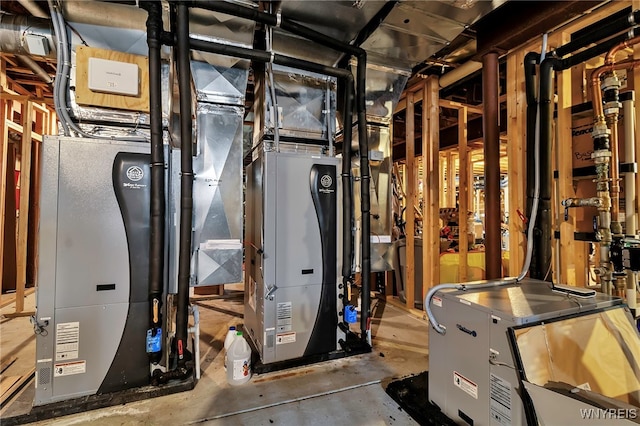 utility room with water heater