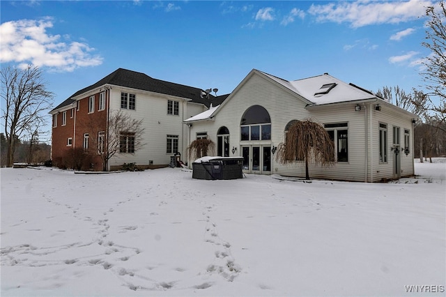 view of snow covered property