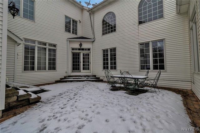 view of snow covered patio