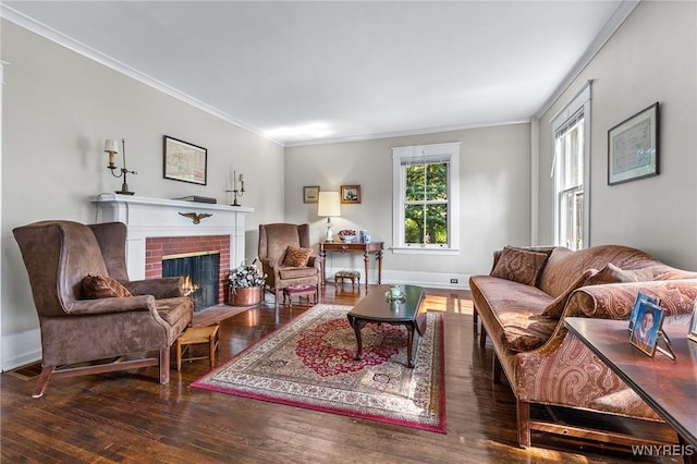 living room featuring dark wood-type flooring, crown molding, and a brick fireplace