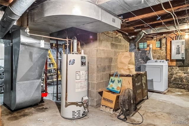 utilities featuring gas water heater, washer / dryer, heating unit, and electric panel