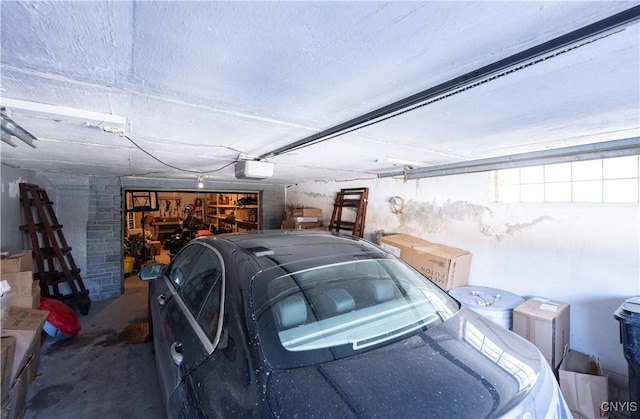 garage featuring a garage door opener