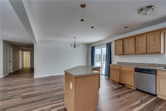 17200 Evans Rd, Hounsfield, NY 13634 - kitchen featuring a kitchen island, a chandelier, stainless steel dishwasher, and dark wood-type flooring