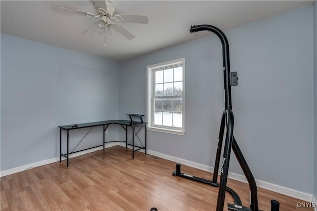 17200 Evans Rd, Hounsfield, NY 13634 - exercise room with light wood-style flooring, baseboards, a ceiling fan, and visible vents