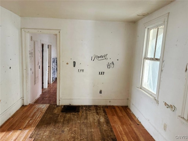 empty room featuring hardwood / wood-style floors