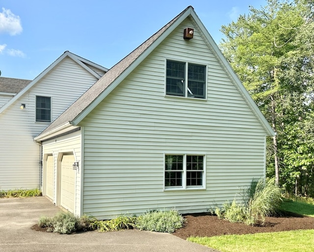 view of home's exterior with a garage