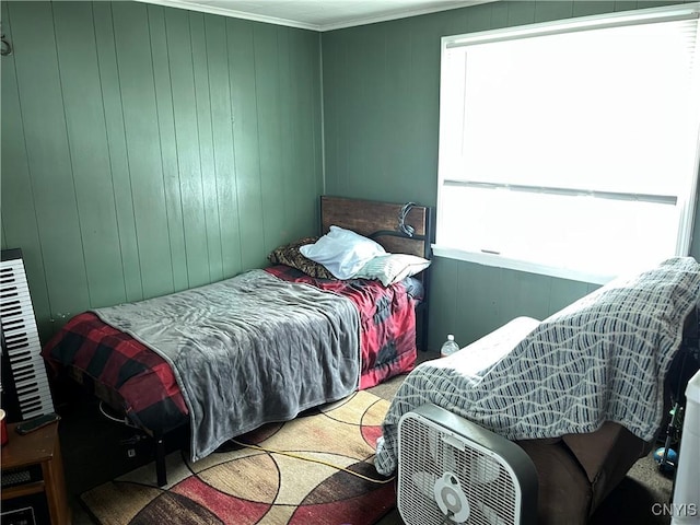 bedroom featuring crown molding