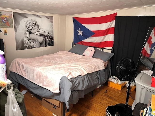 bedroom featuring wood-type flooring