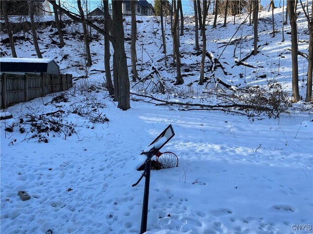 view of yard layered in snow