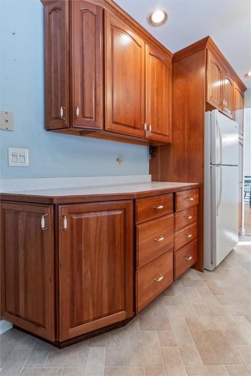 kitchen featuring white fridge