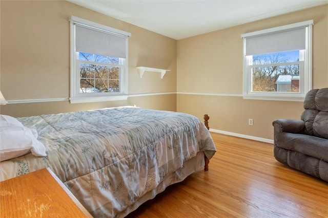 bedroom featuring hardwood / wood-style flooring