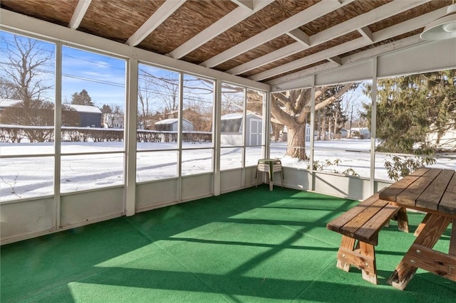 unfurnished sunroom with plenty of natural light