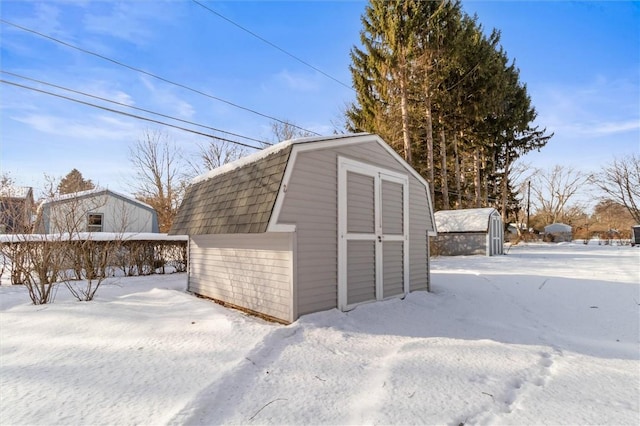 view of snow covered garage