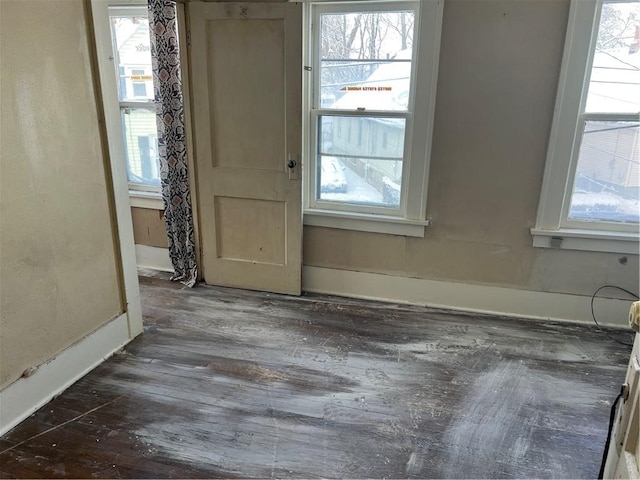 interior space with dark hardwood / wood-style floors