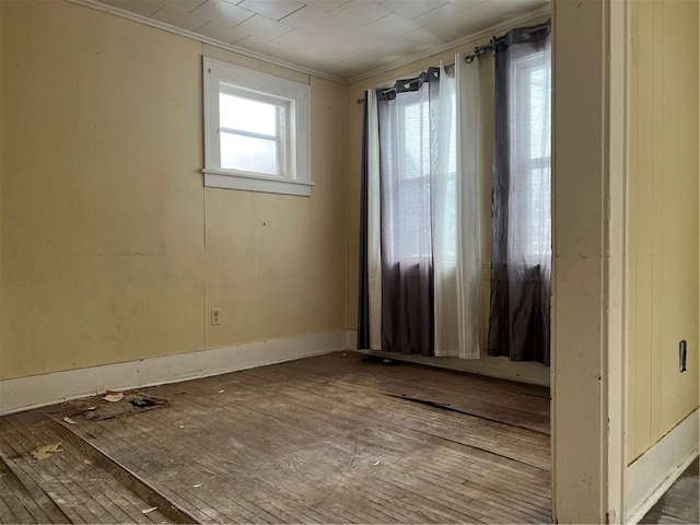 unfurnished room featuring ornamental molding