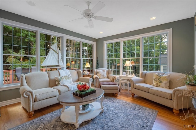 sunroom / solarium with ceiling fan