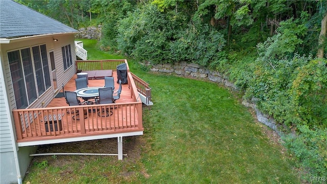 view of yard with a wooden deck