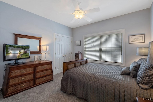 bedroom featuring ceiling fan and carpet floors