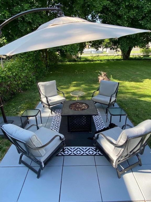 view of patio / terrace with an outdoor fire pit