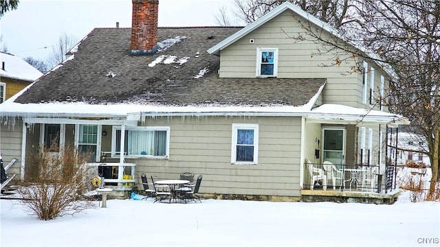 view of snow covered property