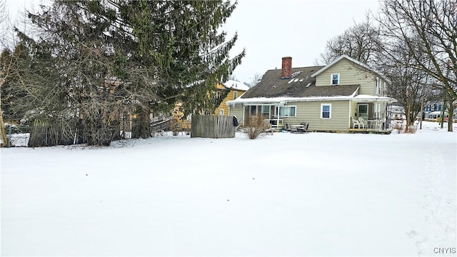 view of snow covered property