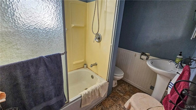 full bathroom featuring toilet, sink, and shower / bathing tub combination