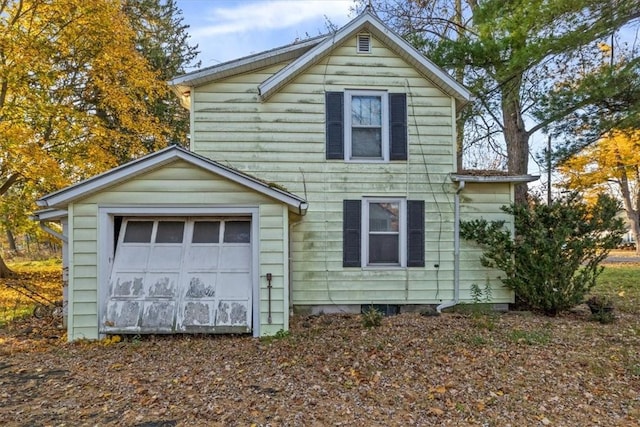 exterior space featuring a garage