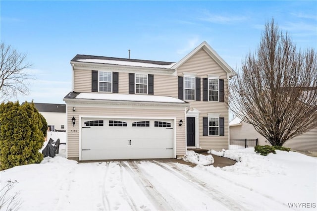 front of property featuring a garage