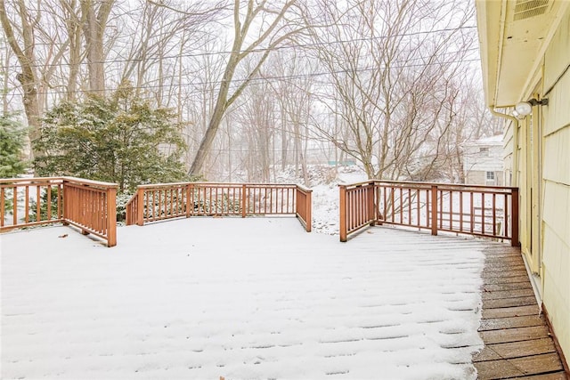 view of snow covered deck