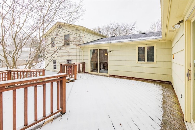 view of snow covered deck